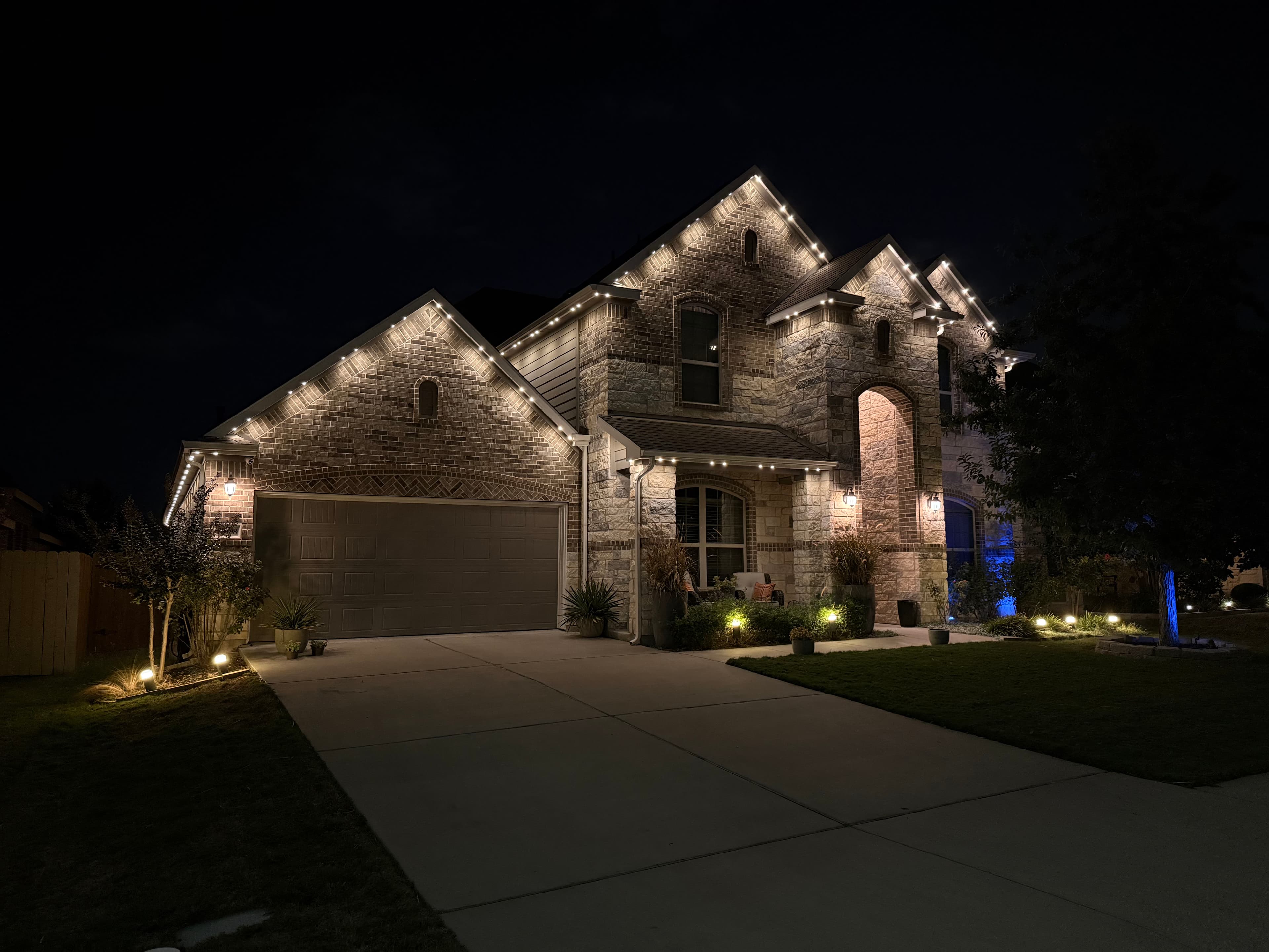 Project Permanent Architectural Lighting on a Dark Brick Home in Rosemount image